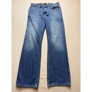 Levis 557 Relaxed Boot Cut Jeans Mens 33x34 Blue Medium Wash Denim 100% Cotton